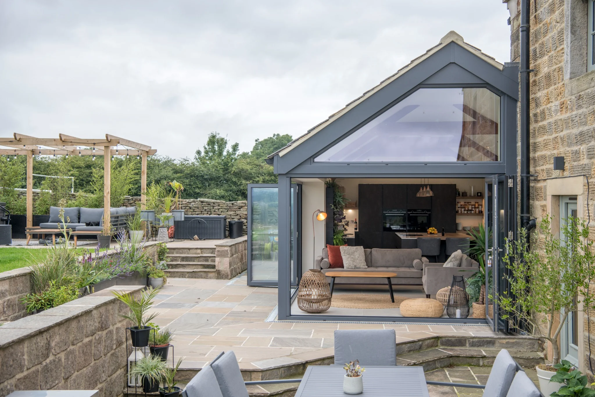 Farmhouse extension with contemporary architectural glazing